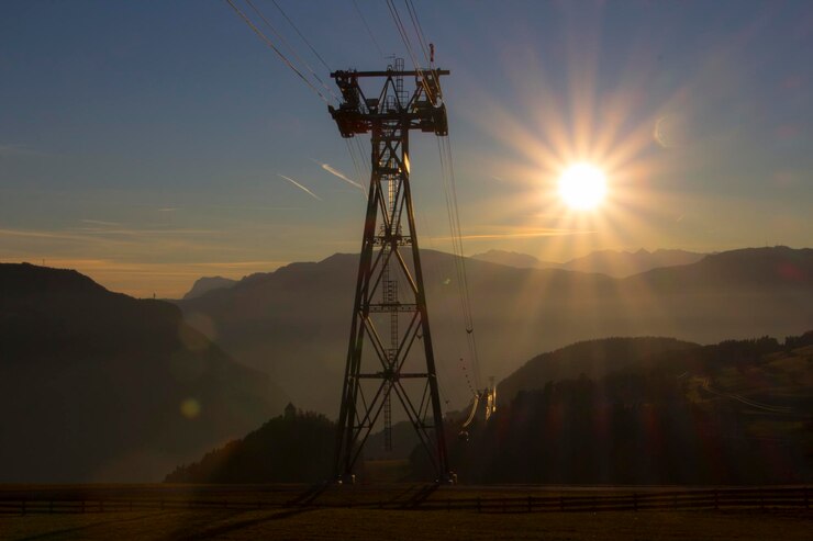 https://unipol.co.ke/wp-content/uploads/2025/01/low-angle-view-overhead-cable-car-tower-field-against-sky-sunset_1048944-26899171.jpg